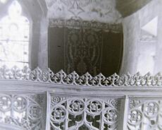 P1070002 Detail of East wall from 1899 interior photo. The wall hangings are still in use as curtains in the Lady Chapel!