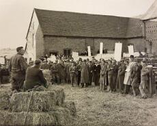 P1040008 War Agricultural Executive Committee meeting at an unidentified farm c1940. The local committees promoted good farming practices to increase production during...